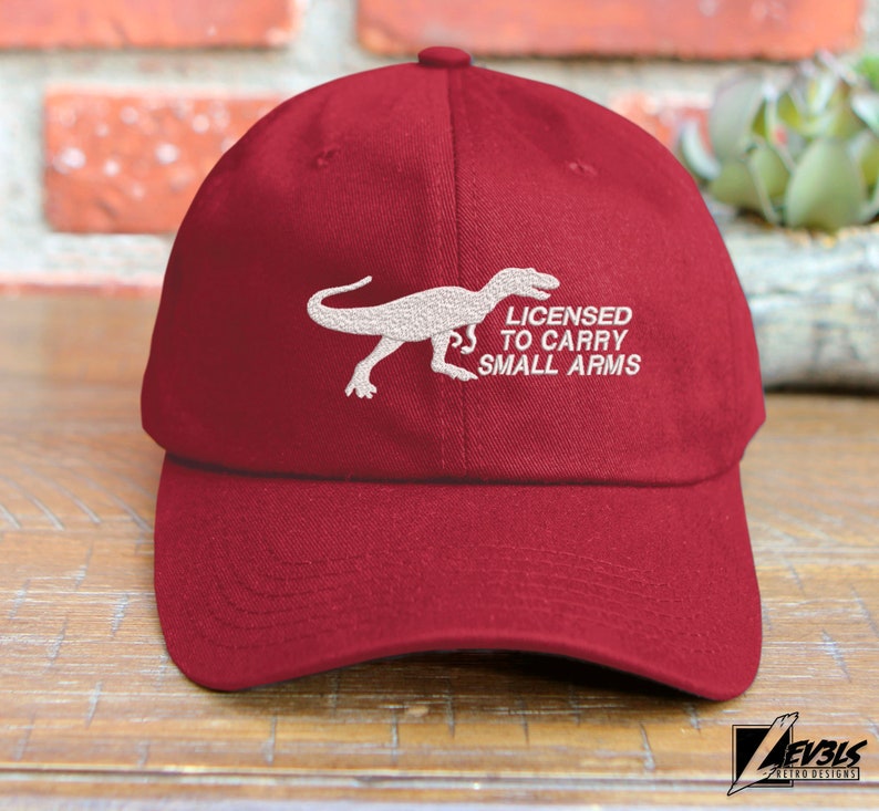 T-Rex Embroidered Dinosaur Unstructured Baseball Cap Licensed To Carry Small Arms