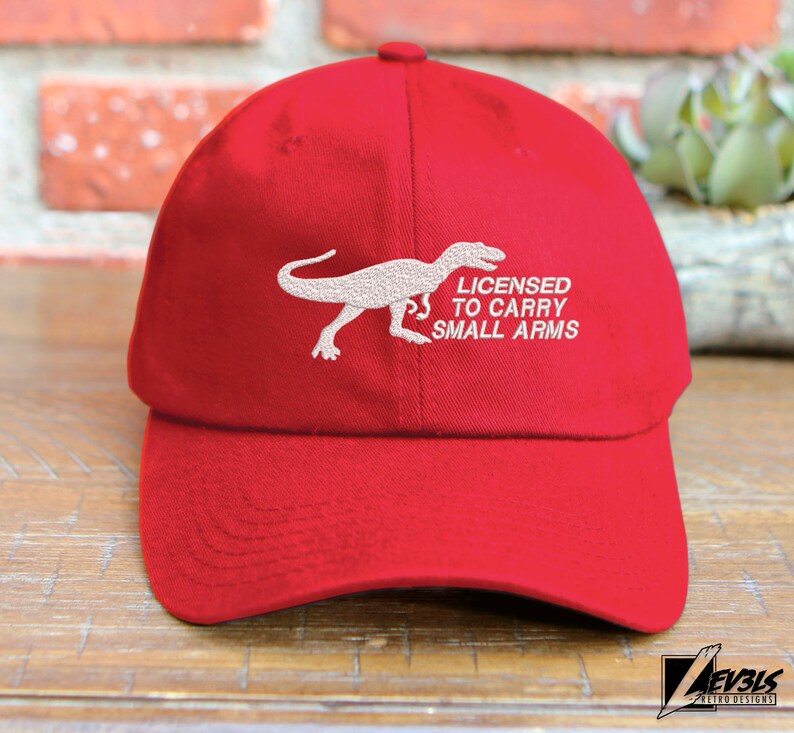 T-Rex Embroidered Dinosaur Unstructured Baseball Cap Licensed To Carry Small Arms