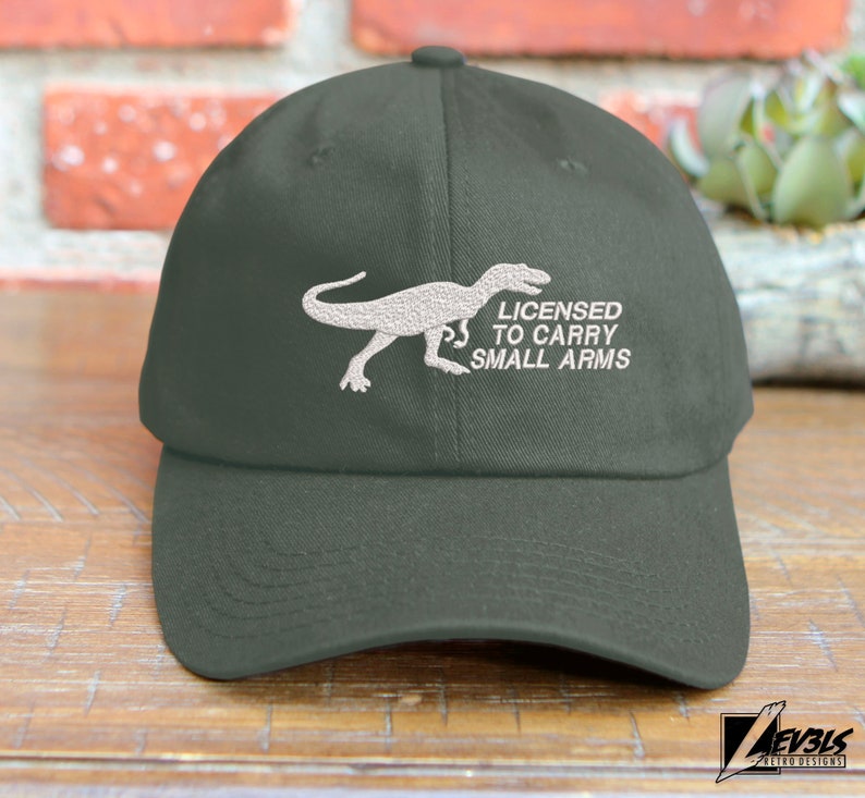 T-Rex Embroidered Dinosaur Unstructured Baseball Cap Licensed To Carry Small Arms